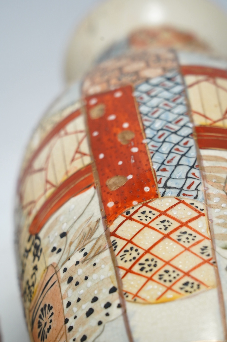 A pair of Japanese enamelled vases and a pair of brocaded Satsuma vases, tallest 32cm high., Condition - fair